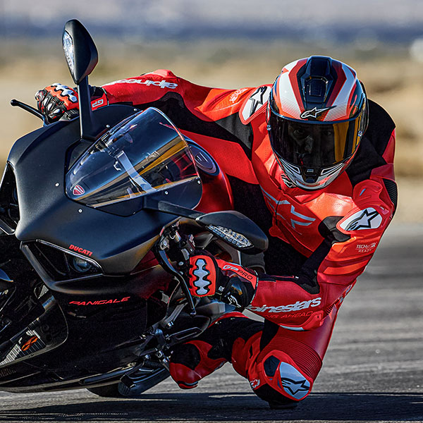 alpinestars_one-piece-suit_leather_gp-plus-v4-sprint_fluo-red-mid-red-white_lifestyle1.jpg