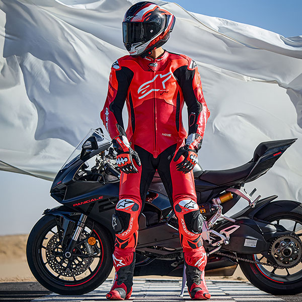 alpinestars_one-piece-suit_leather_gp-plus-v4-sprint_fluo-red-mid-red-white_lifestyle3.jpg