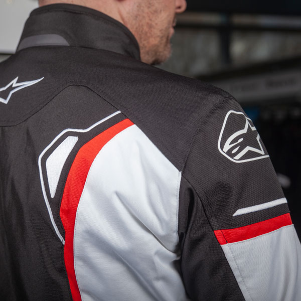 alpinestars_textile_jacket_t-sp-1-waterproof_black-white-red_lifestyle3.jpg