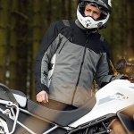 merlin_navar-laminated-d3o-explorer-textile-jacket_black-grey_lifestyle1.jpg